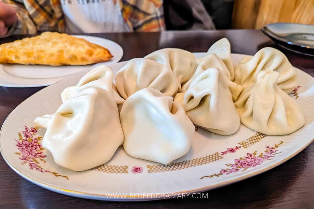 Where to Eat the Best Khinkali in Tbilisi - 2025 Local Guide 16 Plate of freshly made khinkali served at Vakhtanguri’s Chebureki in Tbilisi